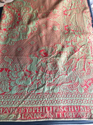 American Coverlet ca. 74" x 79" - " Made by Phillip Schum Lancaster PA" red on green